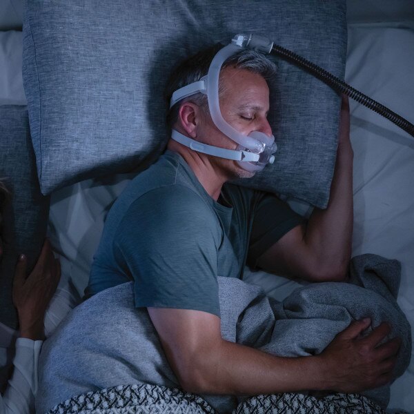 Man Asleep Wearing ResMed F30i
